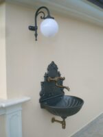 Fontana a muro con sifone in ottone brunito